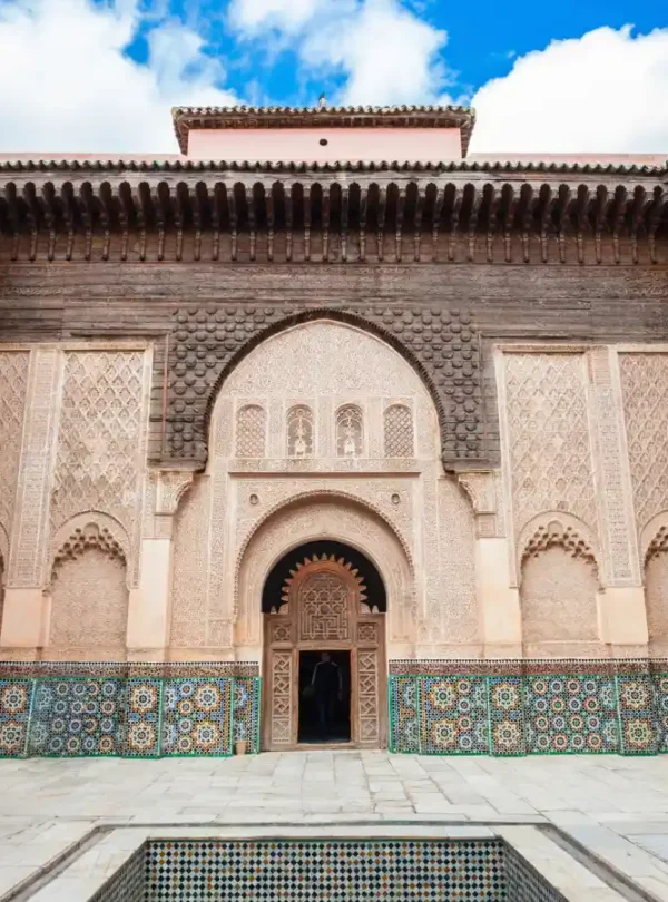 Stunning architecture of Medersa Ben Youssef courtyard during a guided tour in Marrakech